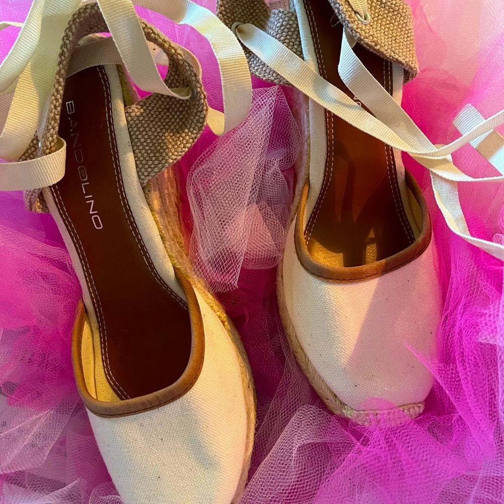 Wedge heels. Never worn. No box